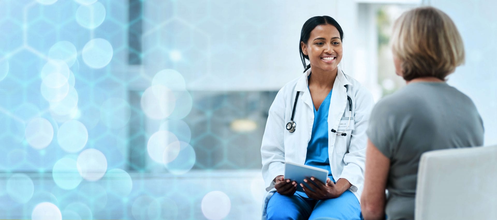 doctor speaking with patient