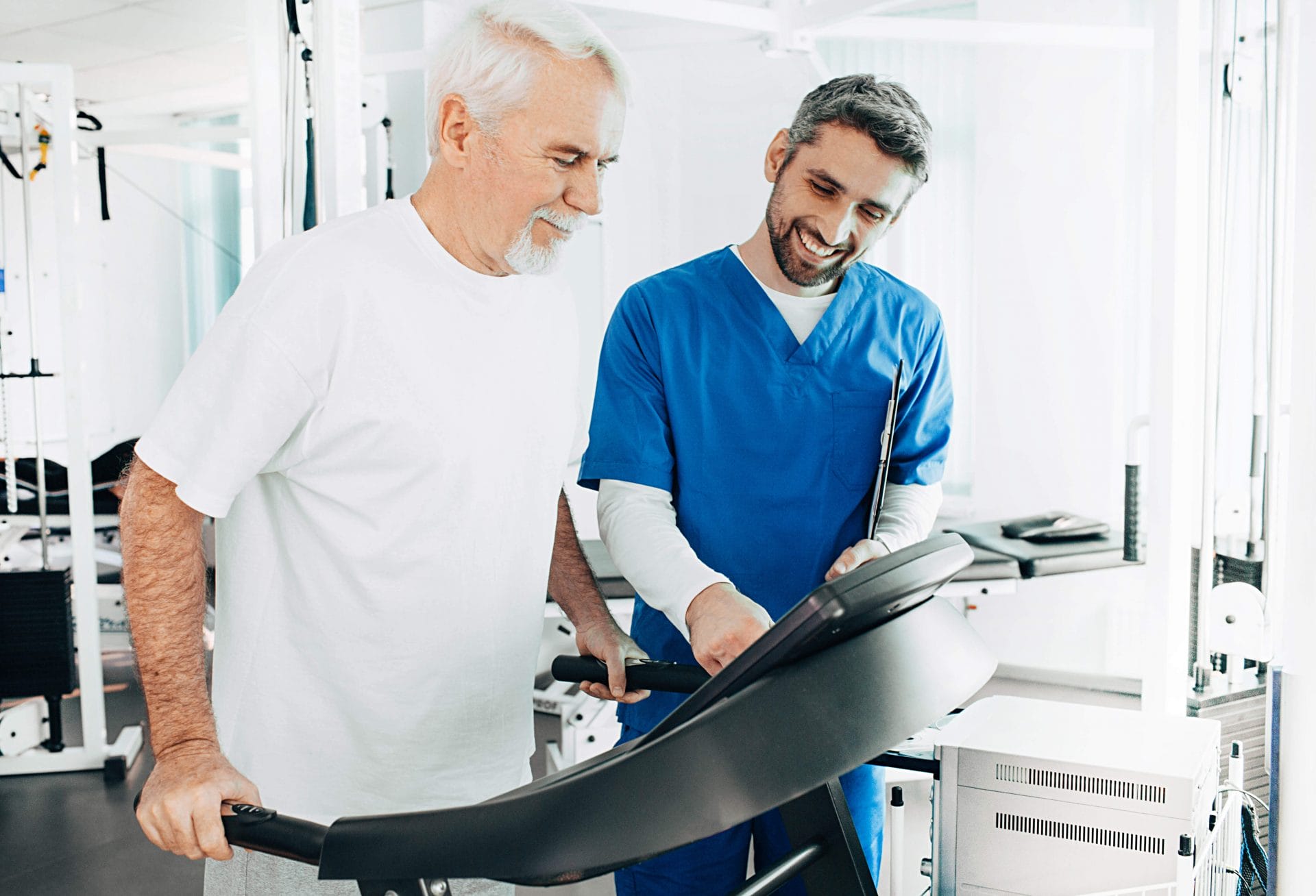 man walking on a treadmill with PT