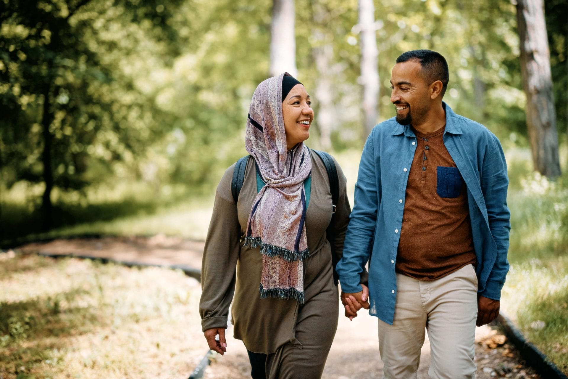 couple walking in the woods