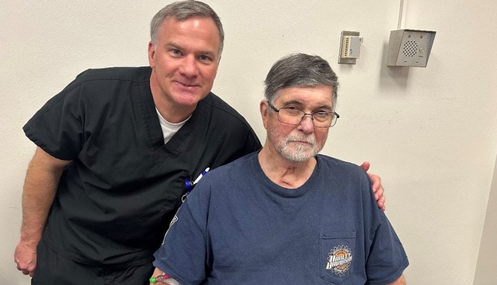 Director of Physical Therapy Daniel Ramsey with Mr. McDonald.