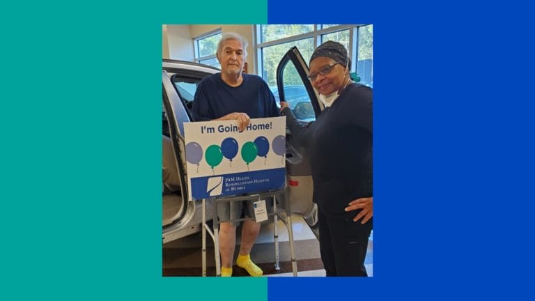Robert with a member of the therapy team