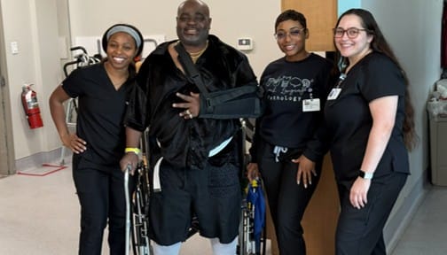 Kevin Crumedy with Houston Heights rehab staff
